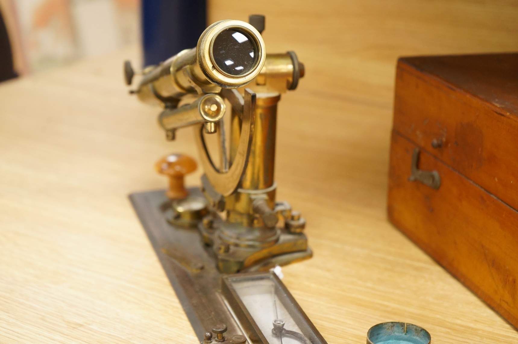 A German brass alidade by F. Sartorius, Göttingen, number 1755, 58.5cm wide, contained within a fitted birch case with applied maker’s label and other reference markings, the case; 63cm wide, 14cm high, 25cm deep at the